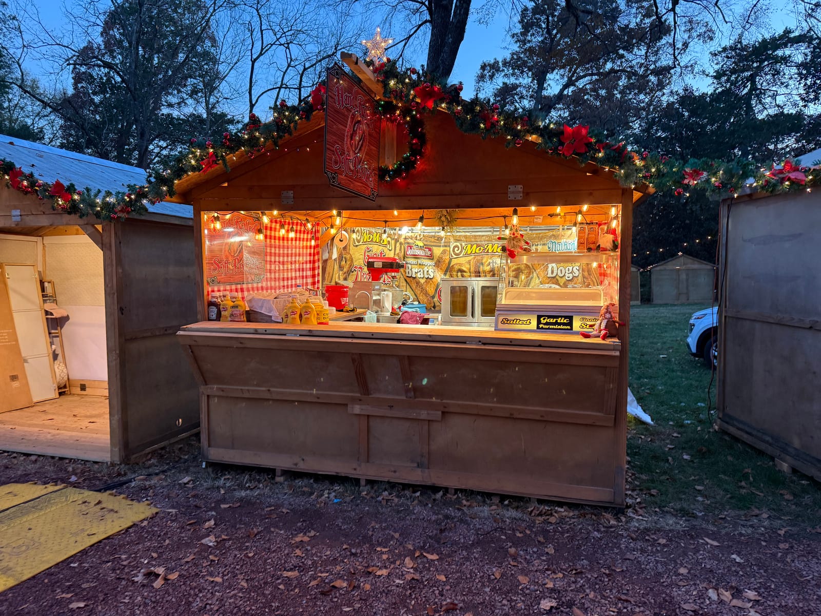 Happy customers enjoying pretzels at the farmers market